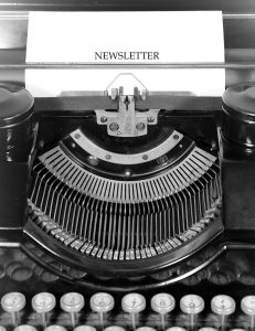 Old typewriter referencing Newsletters